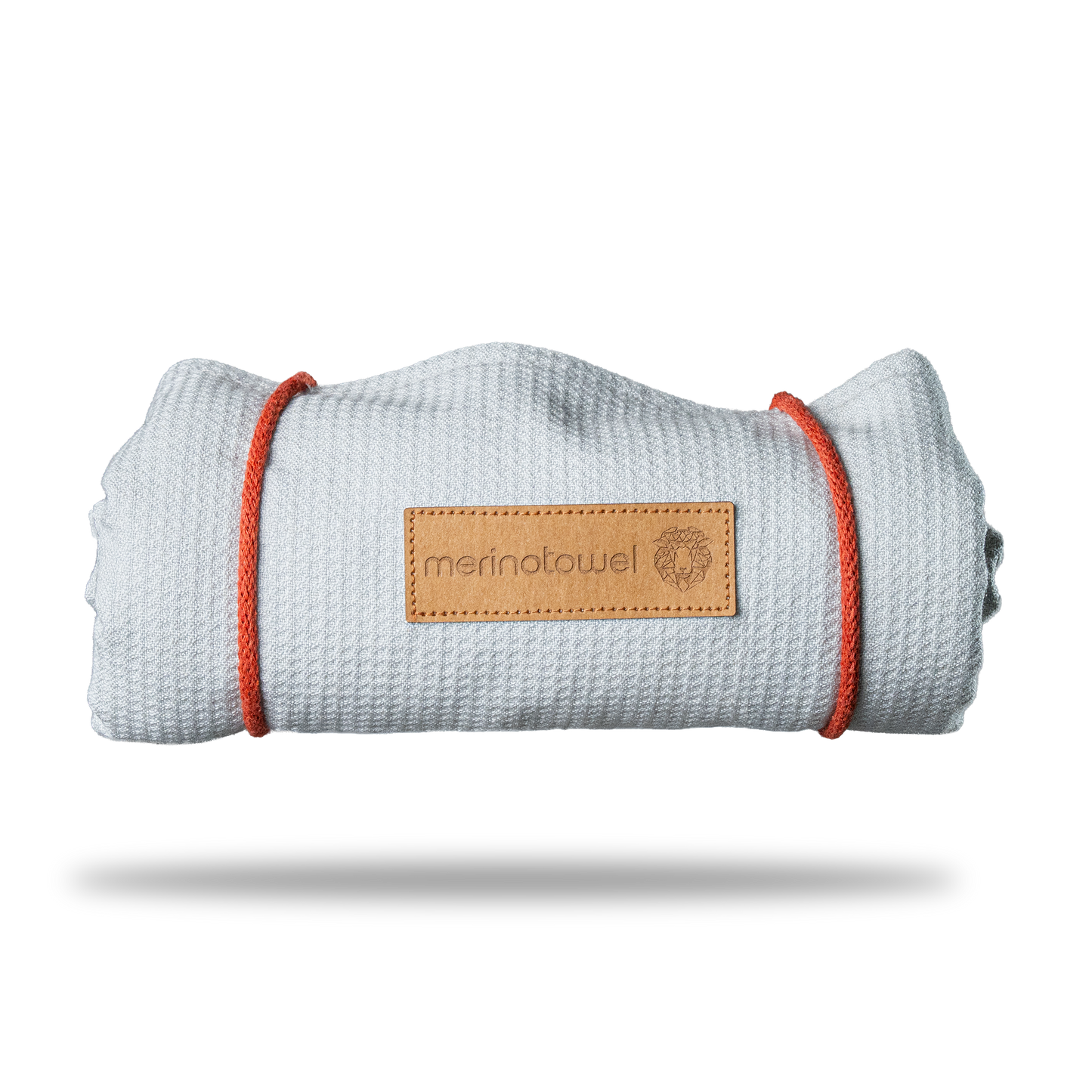 Merino × Lyocell Handtuch zusammengerollt